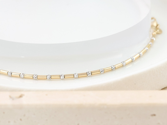 Bransoletka złota z kulek i rurek