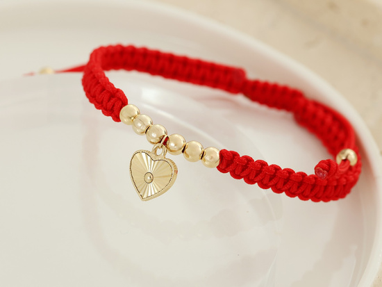 Bransoletka złota serce i kulki na czerwonym sznurku