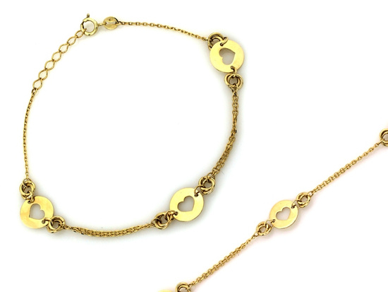 Złota bransoletka z łańcuszków ozdoby z wycinanymi sercami