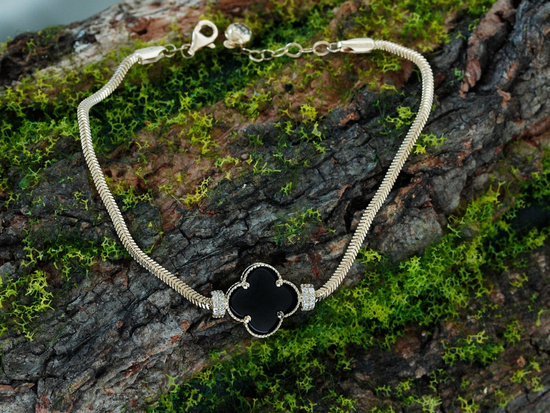 Bransoletka złota z cyrkoniami i czarnym onyksem z kwiatkiem