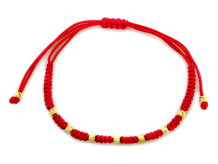 Bransoletka złota kulki na czerwonym sznurku