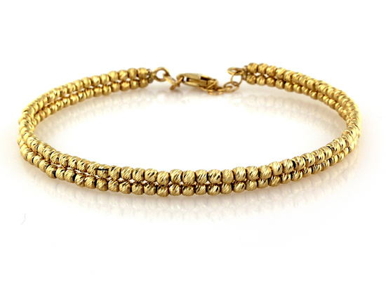 Bransoletka złota sztywna zdobiona małymi kuleczkami