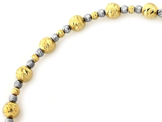 Złota bransoletka sztywna z kulkami