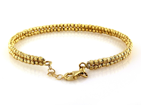 Bransoletka złota sztywna zdobiona małymi kuleczkami