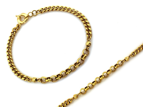 Bransoletka złota z kulkami z łączonych łańcuszków