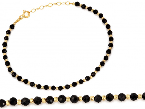 Złota bransoletka ze złotych kulek i onyksów