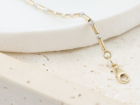 Bransoletka złota z kulek i rurek