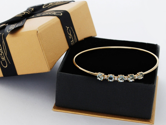 Bransoletka złota sztywna z topazami naturalnymi