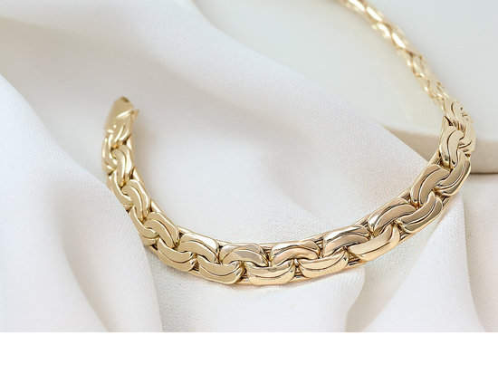 Złota efektowna bransoletka taśma