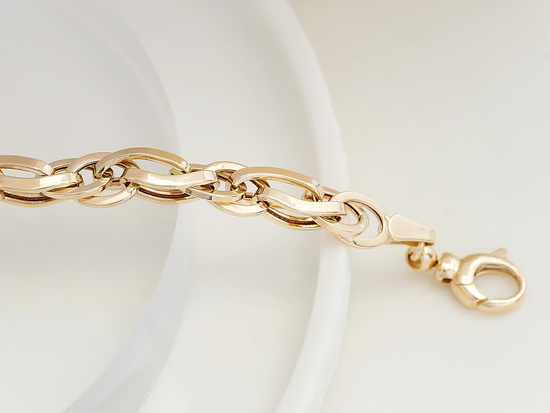 Złota bransoletka z przeplatanych ogniw