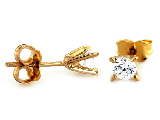 Kolczyki złote z cyrkonią na sztyfcie przy uchu
