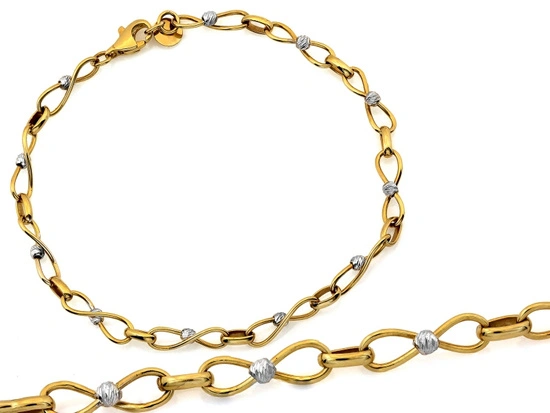 Bransoletka złota przeplatana z kulkami z białego złota