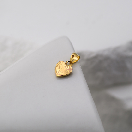 Złota zawieszka 585 - serduszko z masą perłową