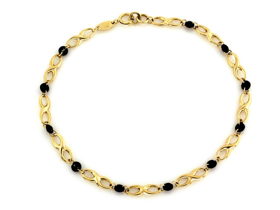 Złota bransoletka z nieskończoności z czarnymi kamieniami