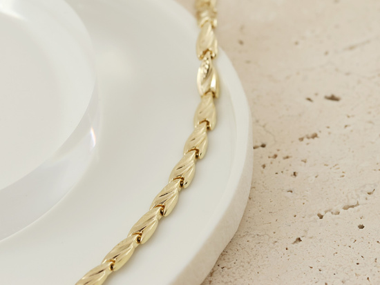 Bransoletka złota z tłoczonych elementów