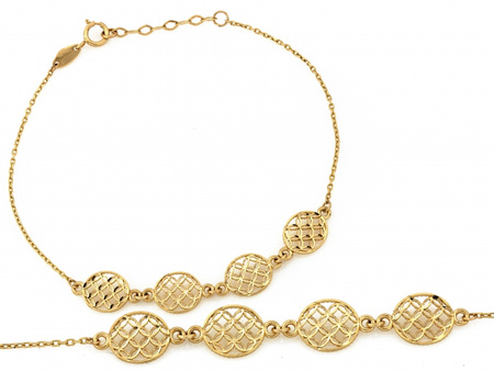 Złota bransoletka łańcuszkowa z kilkoma okrągłymi elementami