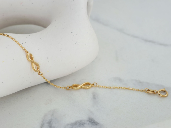 Bransoletka złota delikatna z nieskończonościami