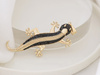 Duża złota zawieszka jaszczurka z czarnymi cyrkoniami
