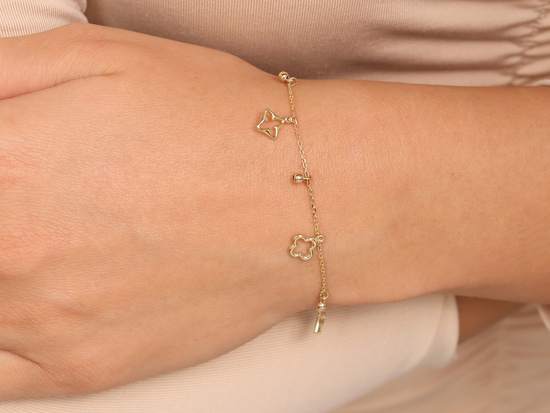 Bransoletka złota z zawieszkami z kuleczkami