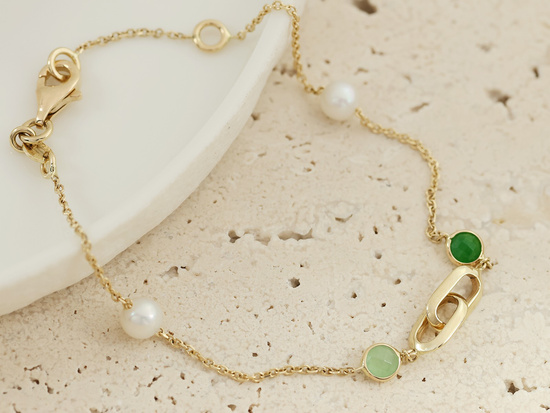 Złota bransoletka z perłami i zielonymi kamieniami