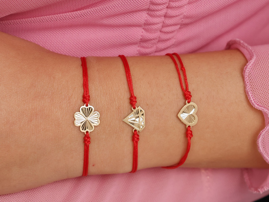 Bransoletka złota diament graficzny na czerwonym sznurku