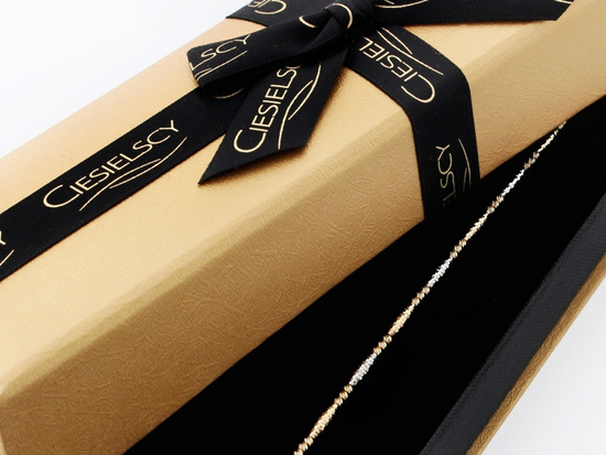 Bransoletka złota dwukolorowa z kuleczkami i podłużnymi elementami