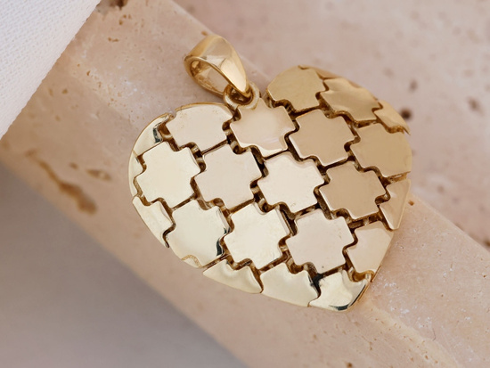 Złota zawieszka oryginalna serce z ruchomych elementów