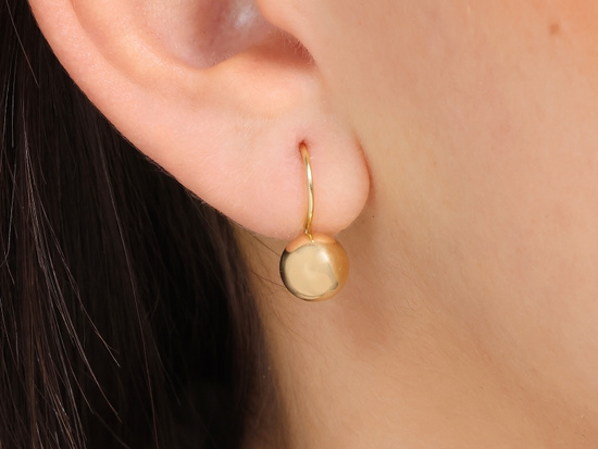 Kolczyki złote półkule błyszczące na biglu
