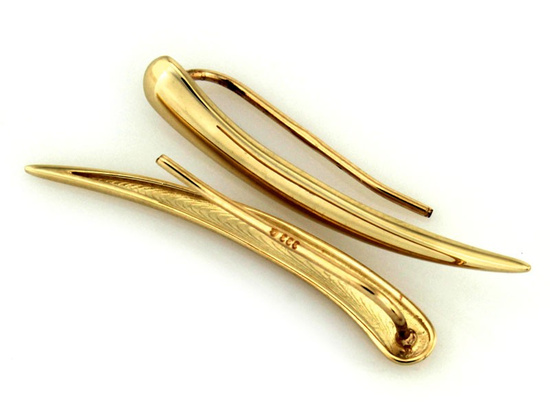 Złote kolczyki nausznice