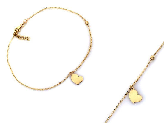 Złota bransoletka na nogę z wiszącym sercem