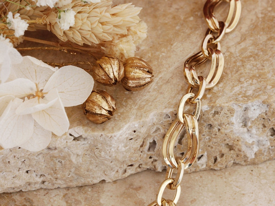 Złota bransoletka z dużych elementów