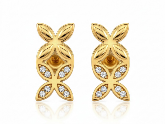 Złote kolczyki dwa kwiatki na sztyfcie przy uchu