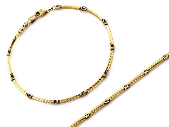 Złota bransoletka ze sztywnych elementów