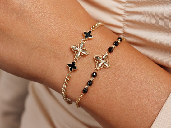 Bransoletka złota z onyksami z modnym kwiatkiem