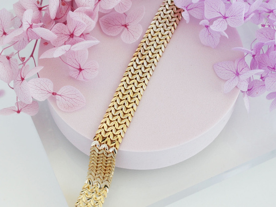 Złota bransoletka szeroka błyszcząca taśma z ruchomych elementów