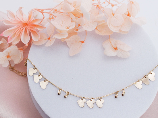 Bransoletka złota z kuleczkami i wiszącymi sercami