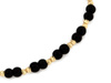 Bransoletka sznurkowa złote i czarne kulki