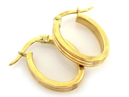 Złote kolczyki koła dla kobiety