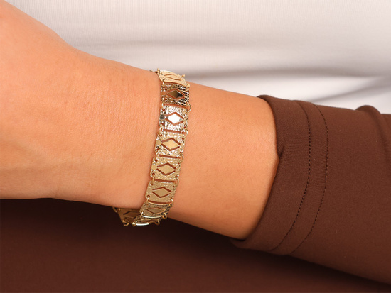 Bransoletka złota szeroka taśma z ruchomych elementów