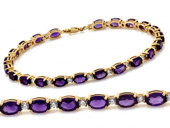 Bransoletka złota z fioletowymi owalnymi cyrkoniami