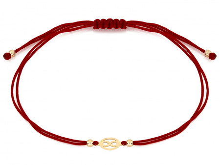 Bransoletka złota delikatna nieskończoność na czerwonym sznurku