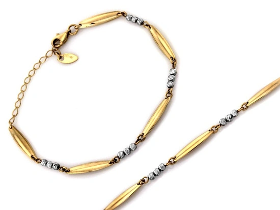 Bransoletka z podłużnych elementów z białymi kulkami