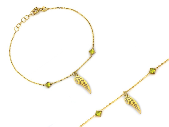 Złota bransoletka ze skrzydłem i zielonymi kamieniami