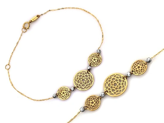 Złota bransoletka łańcuszkowa z ażurowymi elementami