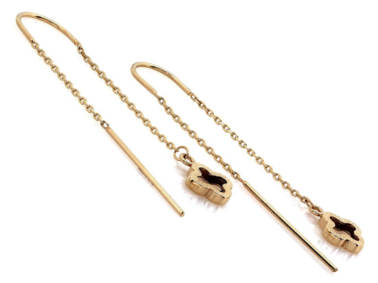 Długie złote kolczyki przeciągane z błyszczącym kwiatkiem