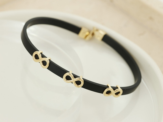 Bransoletka złota nieskończoności na czarnym pasku