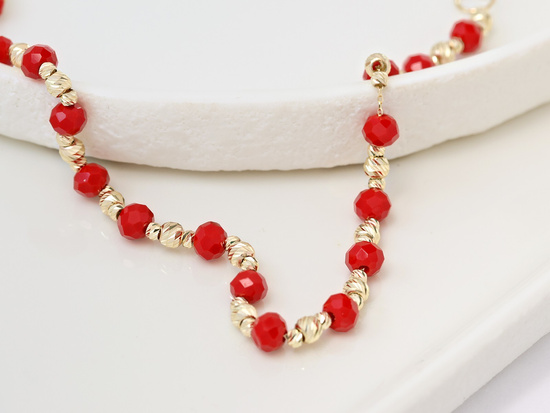 Bransoletka złota z kulkami i czerwonymi kamieniami