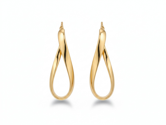 Złote kolczyki koła owalne sztywne nowoczesne